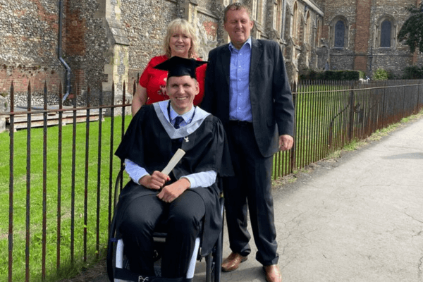 client tom graduation with others