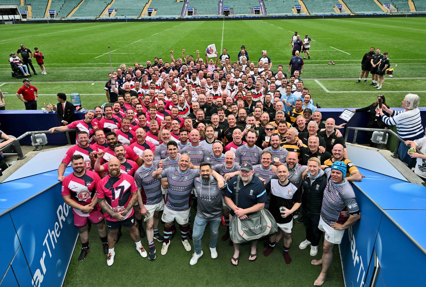 Group of people standing in Allianz Stadium tunnel